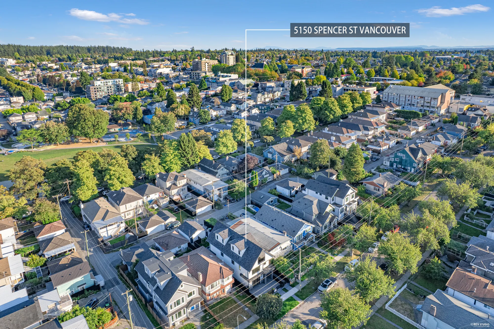 Aerial over the immediate block with the property marked