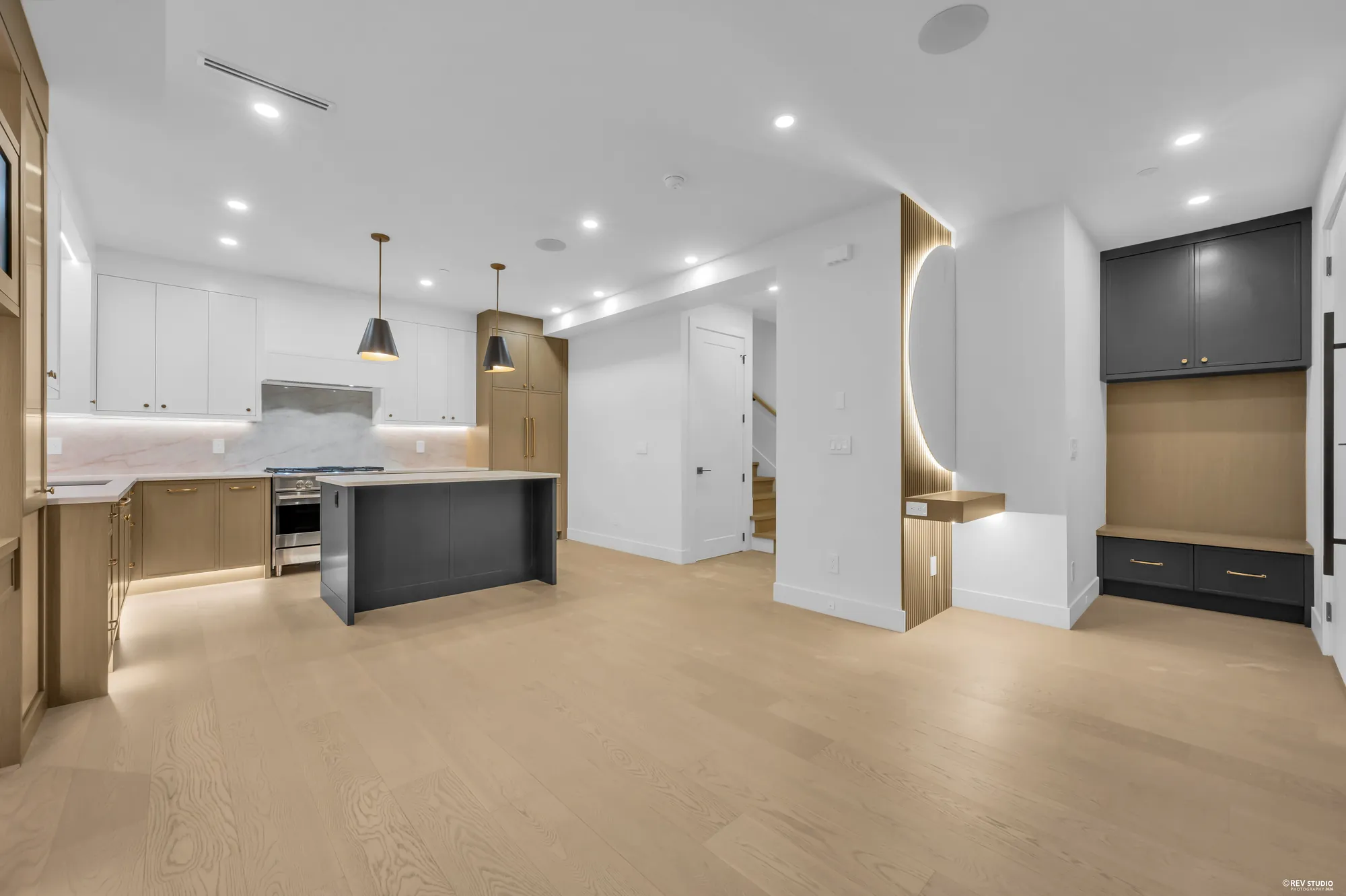 Kitchen from the dining end, showing the island end and the cabinetry